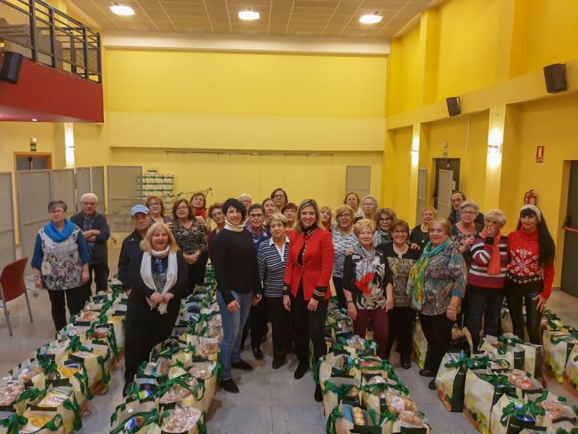 Entrega cestas y juguetes de Ada Byron